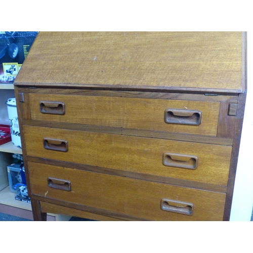 19 - A mid-century teak writing bureau with red leather writing board.