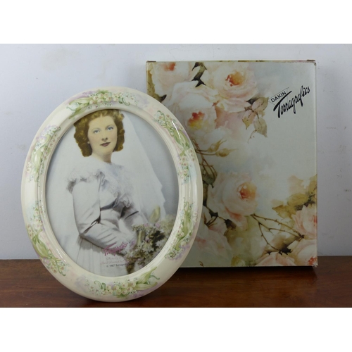 26 - A 1987 Terragrafics, Inc, ceramic photo frame. Measuring approx 31cm.