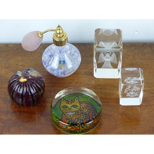 40 - A collection of glass paperweights and a Caithness glass atomiser.