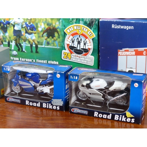 45 - An assortment of model motorbikes, cars and a Subbuteo board game.