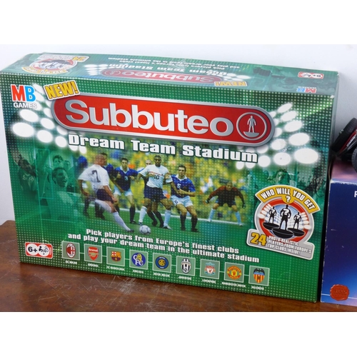 45 - An assortment of model motorbikes, cars and a Subbuteo board game.