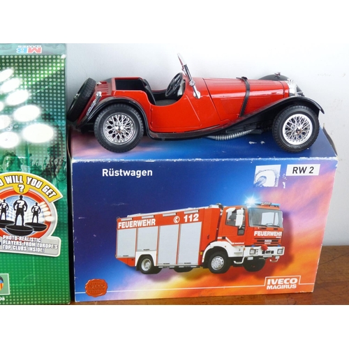 45 - An assortment of model motorbikes, cars and a Subbuteo board game.