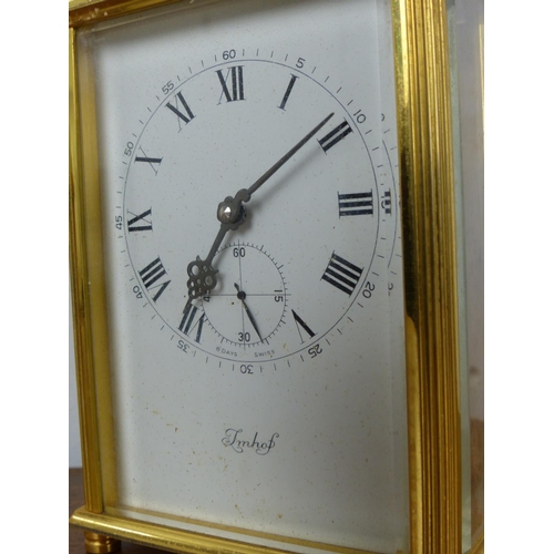 49 - A vintage Imhof brass cased carriage clock.