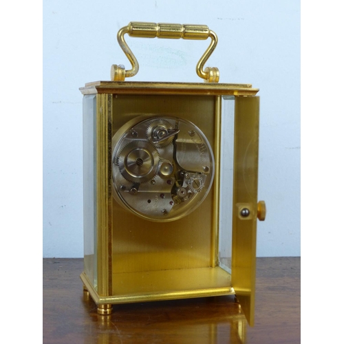 49 - A vintage Imhof brass cased carriage clock.