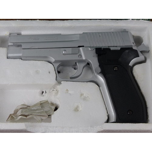 108 - A boxed Sig Sauer P226 pellet gun.