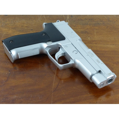 108 - A boxed Sig Sauer P226 pellet gun.