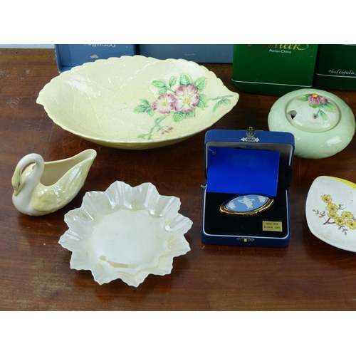 110 - An assortment of various ceramics to include Belleek, Wedgwood & more.