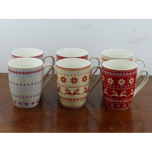 114 - A set of 6 Aynsley Christmas mugs.