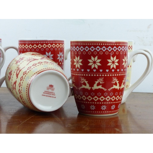 114 - A set of 6 Aynsley Christmas mugs.