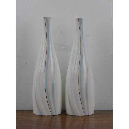 117 - A pair of Royal Doulton 'Impression' vases, each measuring 21cm tall.