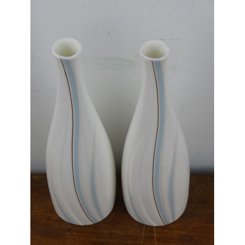 117 - A pair of Royal Doulton 'Impression' vases, each measuring 21cm tall.