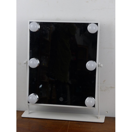 130 - An LED make-up mirror.