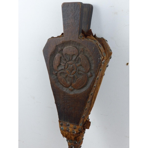 133 - A set of decoratively carved fire bellows. (A/F)