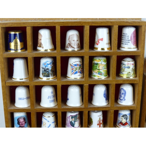 143 - A collection of thimbles.