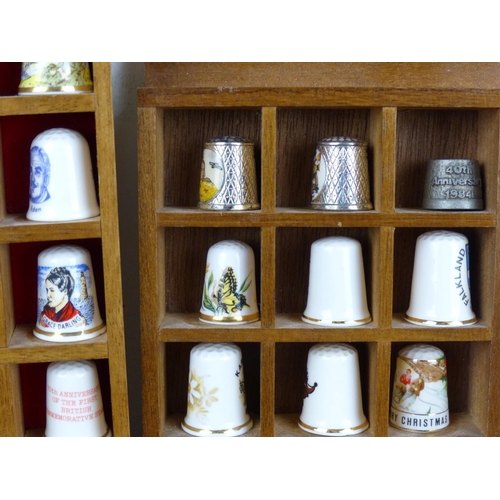 143 - A collection of thimbles.