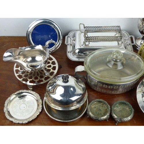 230 - A collection of silver plated items to include claret jug & more.