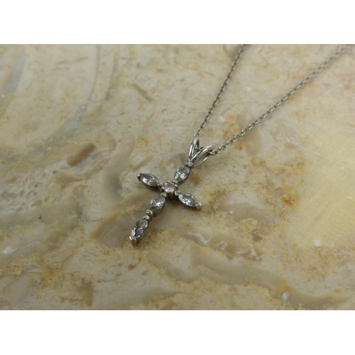 237 - A sterling silver cross pendant with chain.