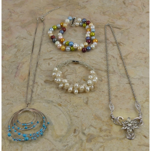 238 - A collection of 2 necklaces & 2 bracelets.