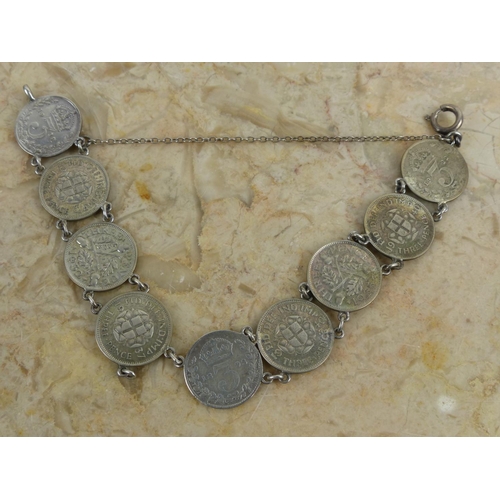 240 - A vintage 3 pence bracelet.