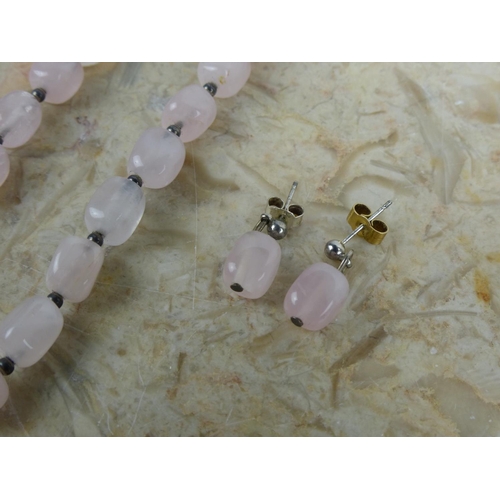 245 - A Rose Quartz necklace & earring set.