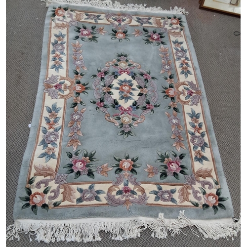 153 - A large decorative rug, measures 48