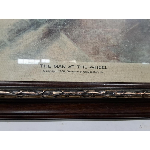 155 - A large vintage print, 'The man at the wheel', measuring 57x48cm.