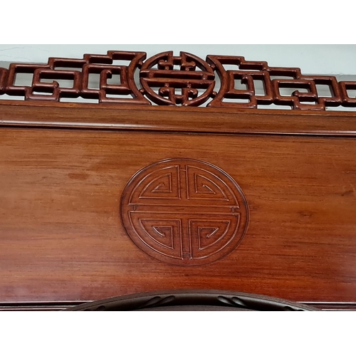 156 - A carved Oriental headboard/ panel.