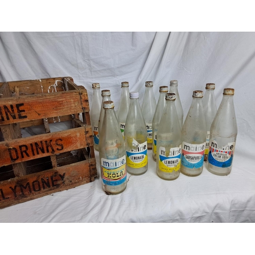 177 - A vintage wooden Maine Soft Drinks Ballymoney crate & assortment of bottles.