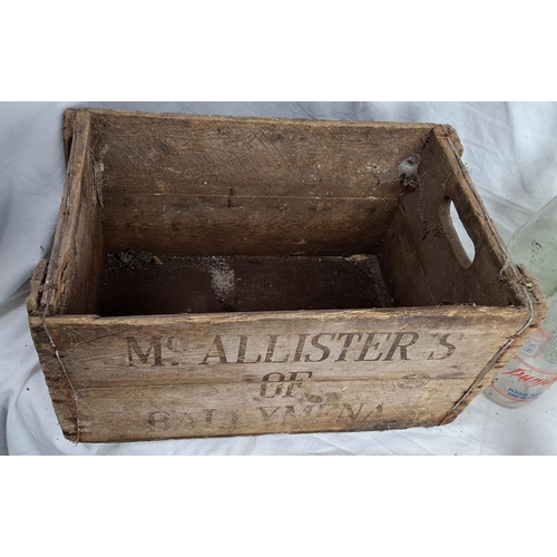 178 - A vintage wooden McAllisters of Ballymena crate & assortment of bottles.