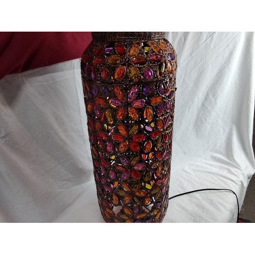 184 - A large decorative lantern/ table lamp, measuring 67cm tall.