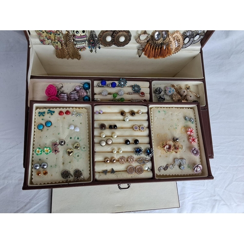 195 - A jewellery box with contents.