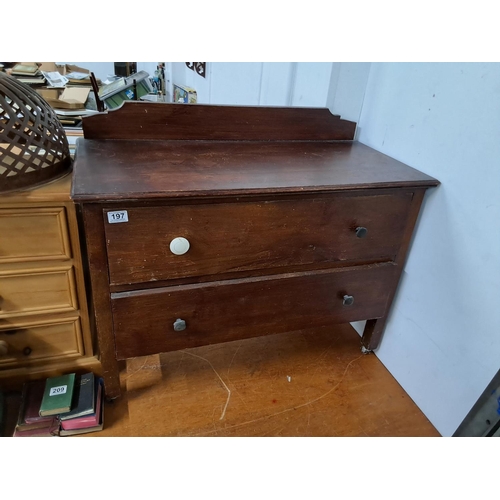 197 - A small antique chest of drawers.