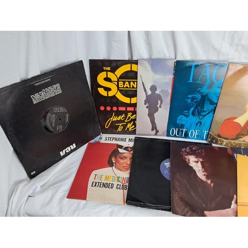 199 - A small collection of records/ albums.