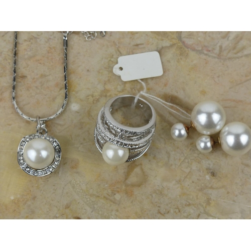 250 - A sterling silver jewellery set, to include necklace, ring & pair of earrings.