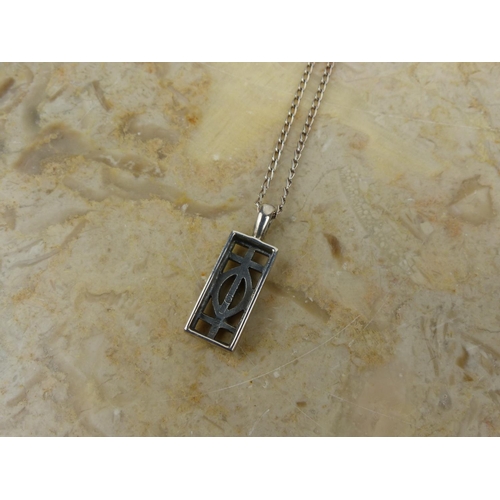 267 - A Sterling Silver necklace with Charles Rene Mackintosh style pendant. Weighing .264 grams.