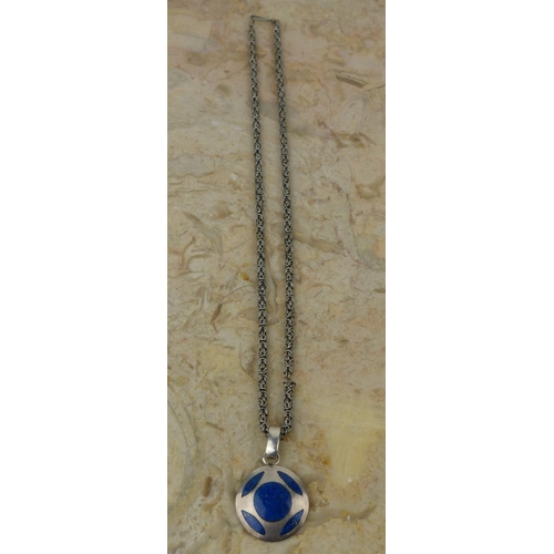 268 - A Sterling Silver necklace with blue enamel & silver pendant. Weighing .900 grams.