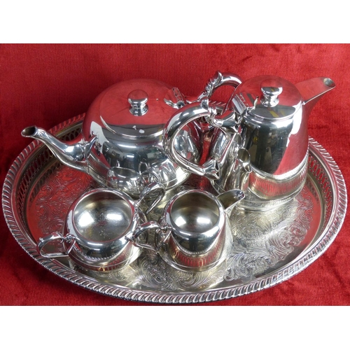 282 - A vintage Silver Plated tea service with tray.