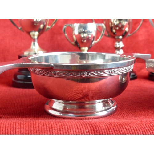 283 - A pair of pewter Quaich's & collection of miniature trophies.