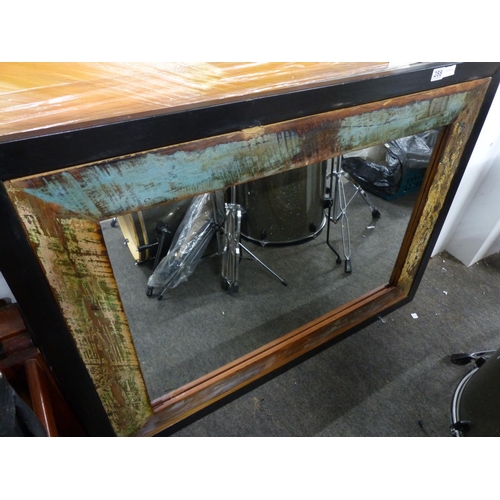 288 - A large mirror with distressed frame.