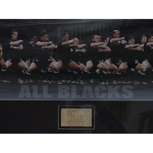 290 - A framed print of the New Zealand All Blacks, framed with New Zealand vs Australia ticket.