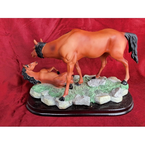 347 - A ceramic horse & foal, produced by the Juliana Collection.