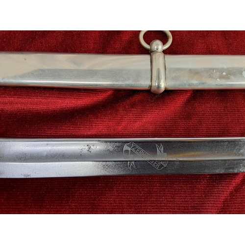 351 - An antique sword with scabbard.