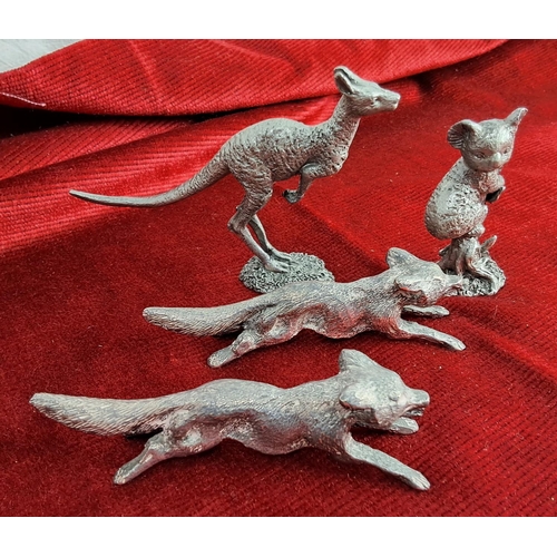 372 - A collection of miniature metal animals to include foxes, a kangaroo & Koala bear.