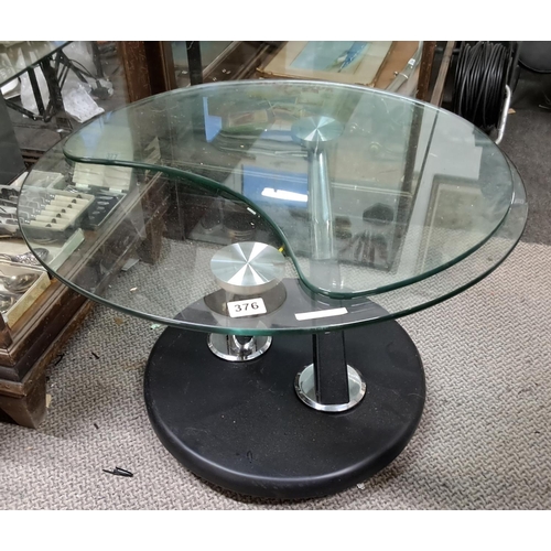 376 - A modern glass coffee table.