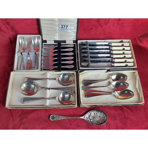 377 - An assortment of cased cutlery.