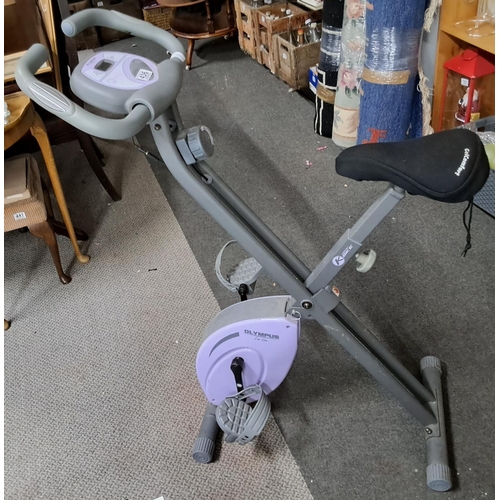 436 - An Olympus exercise bike.