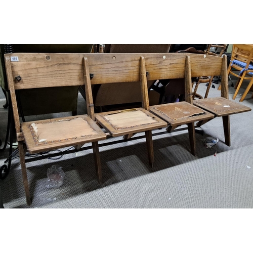 459 - A vintage folding wooden theatre bench.