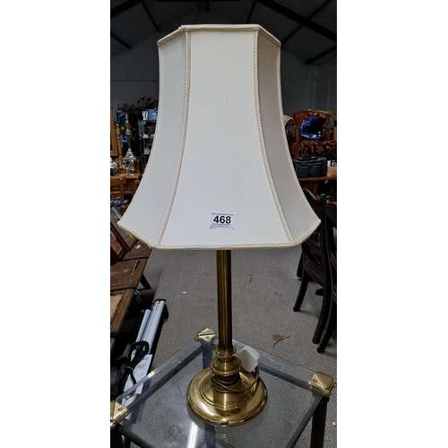 468 - A modern brass table lamp with shade.