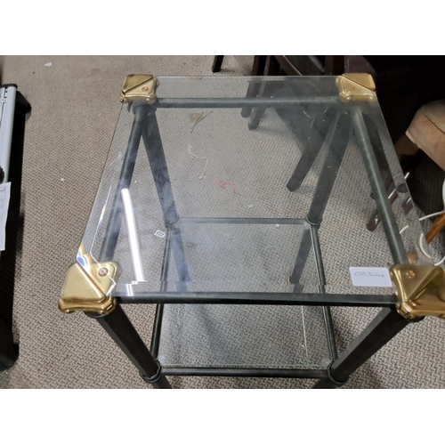 469 - 2 modern glass topped coffee tables.