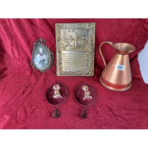 495 - An assortment of items to include hammered copper jug & more.